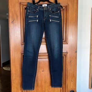 Paige dark denim jeans with zippers on front. Size 27